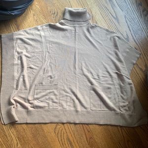 Woman’s Turtle Neck Poncho Sweater